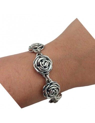 PULSERA PLATA 7 FLORES