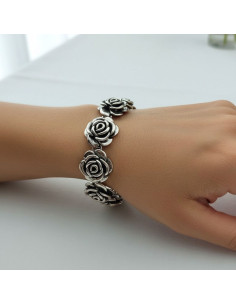 PULSERA PLATA 7 FLORES