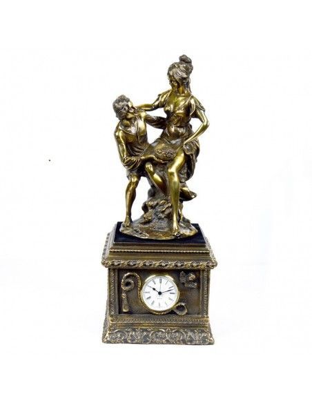 RELOJ DE SOBREMESA CON FIGURA ORO VIEJO